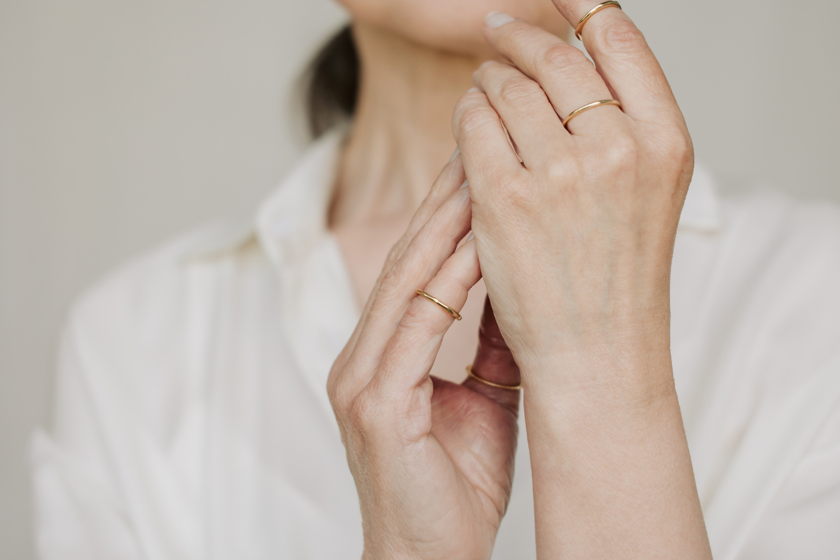 Woman Wearing Gold Rings