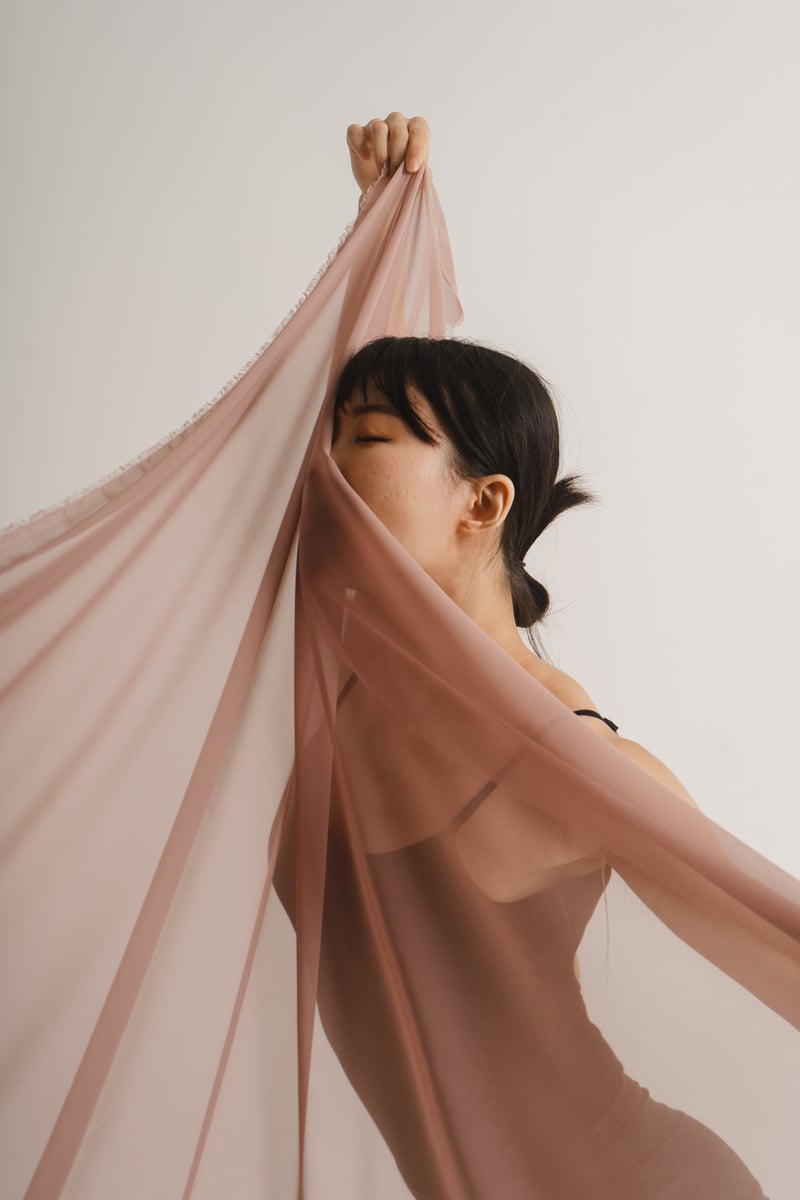 Portrait of a Female Dancer with Beige Fabric