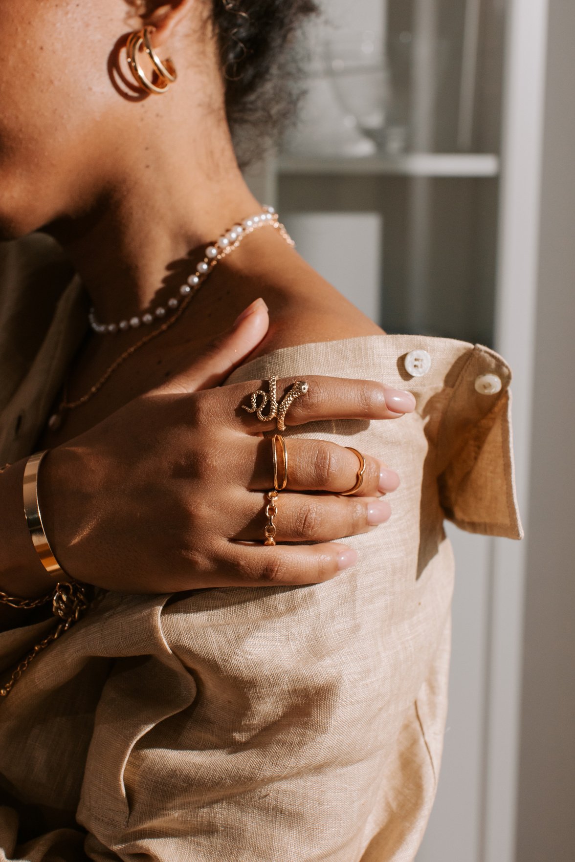 Woman Wearing Gold Jewelry